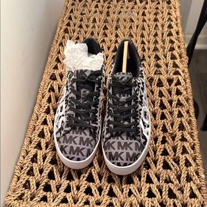 Michael Kors Women’s size 61/2 Monogram Black and White Sneakers